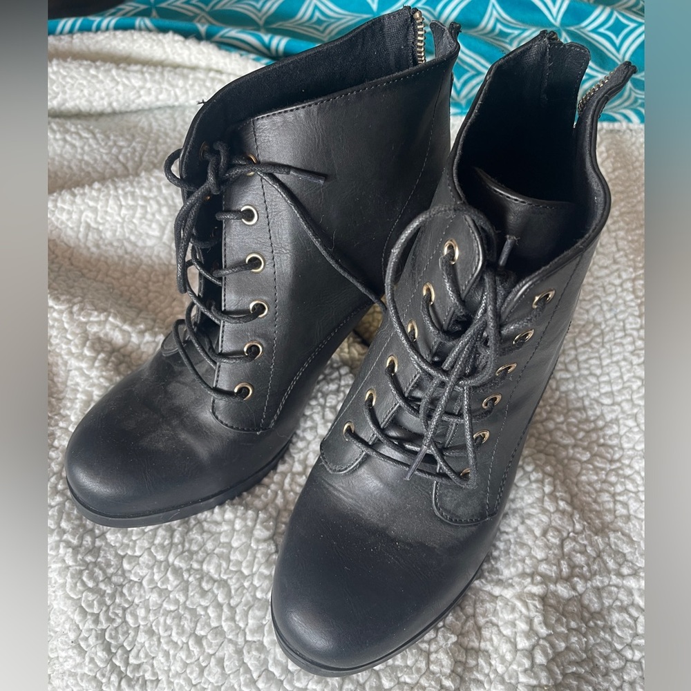 Torrid black booties gold trim 9.5